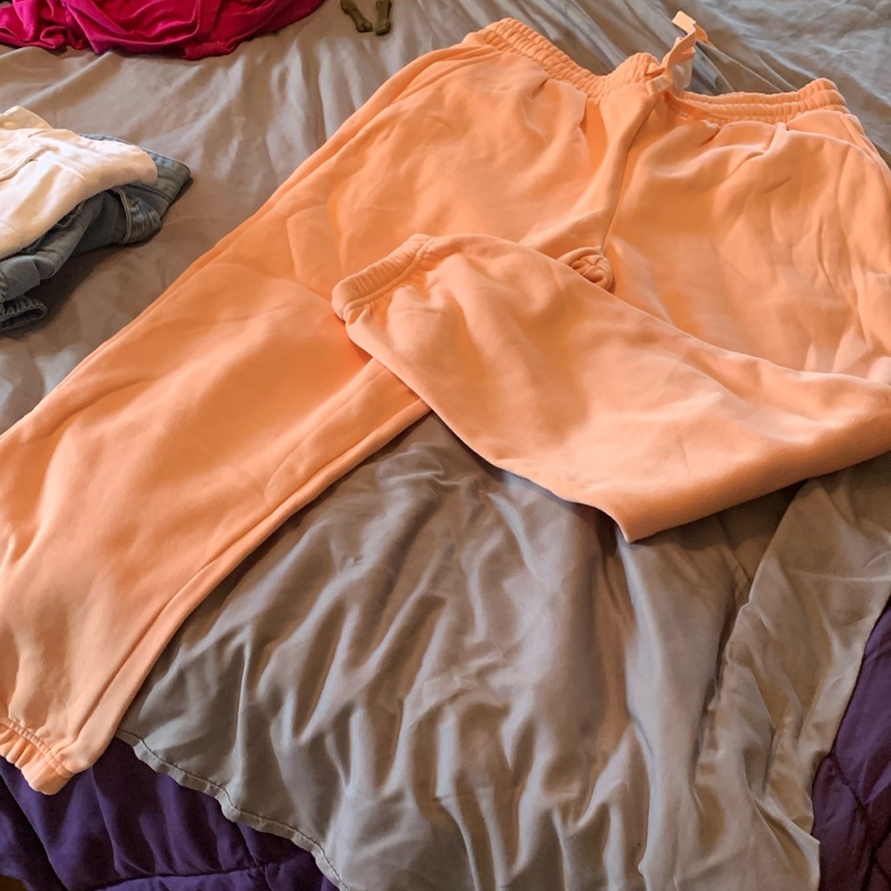 NWOT Fabletics joggers - peach colored.